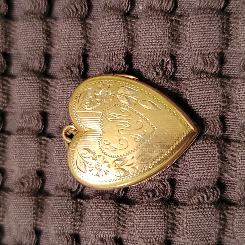 Vintage gold heart shaped locket